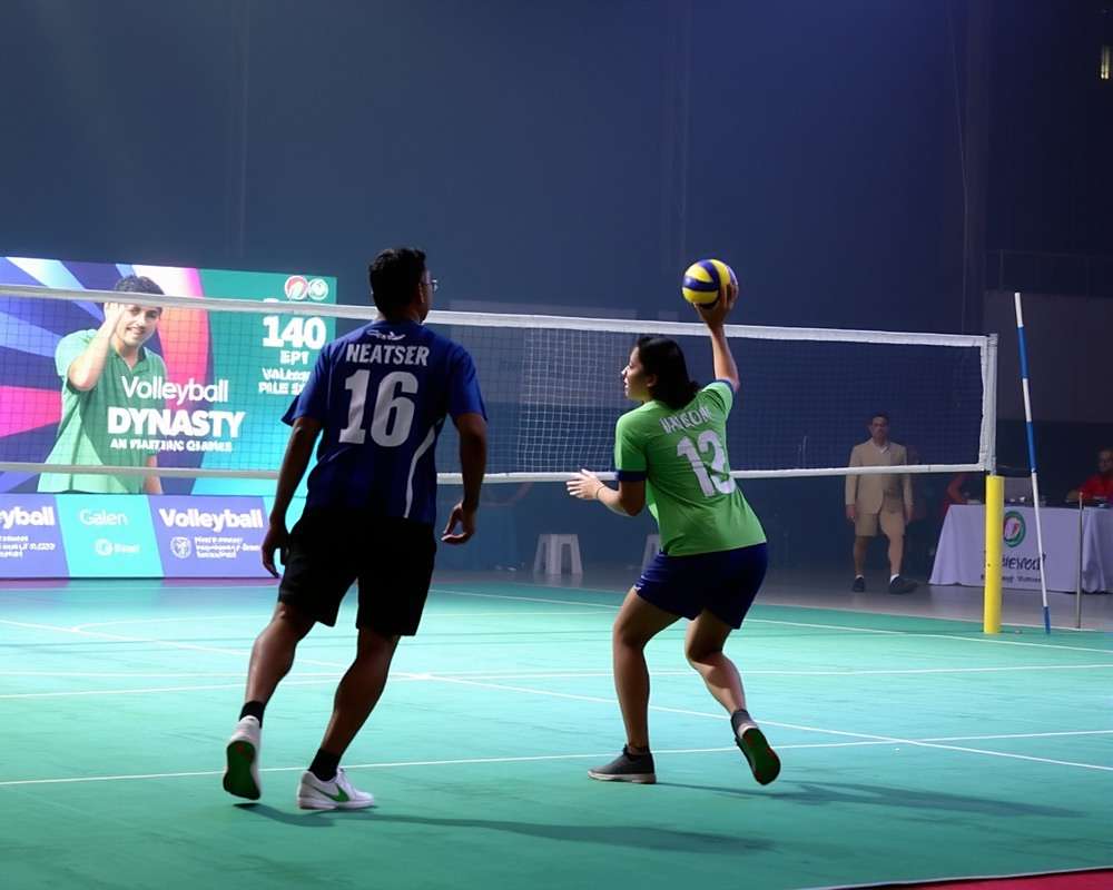 Volleyball Dynasty India national tournament with players competing on stage